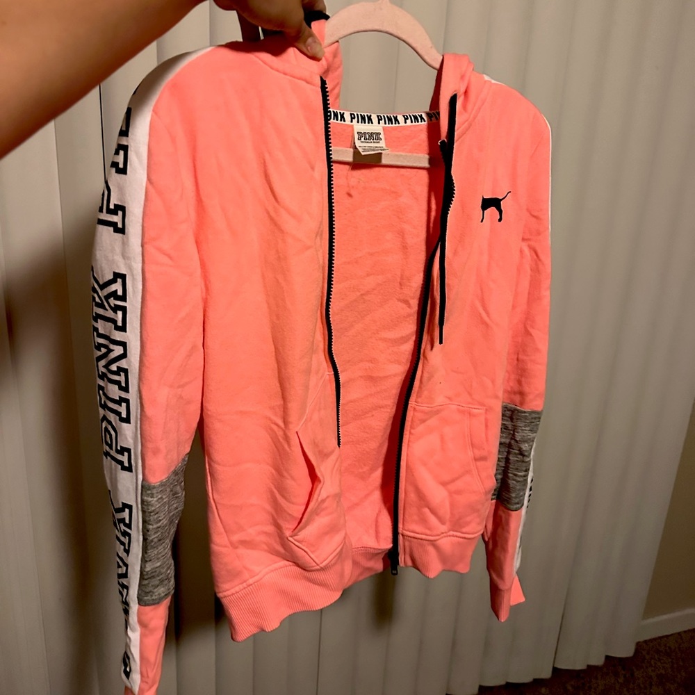 Pink jacket says xs but fits like a small/medium